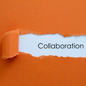 Motivational 'Collaboration' sign reflecting our cooperative process.