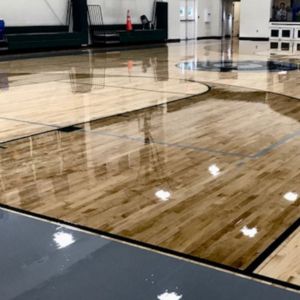 Custom-designed epoxy gym floor featuring vibrant colors and patterns.