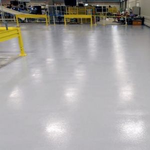 Vast polished concrete floor in an industrial warehouse.